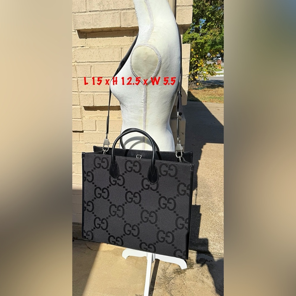 GUCCI Black canvas bag, leather handles